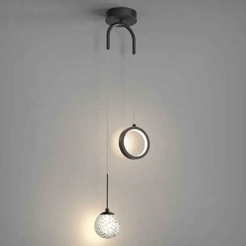 Modern black metal pendant light with circular ring and faceted glass globe for decorbites gold ring led decor