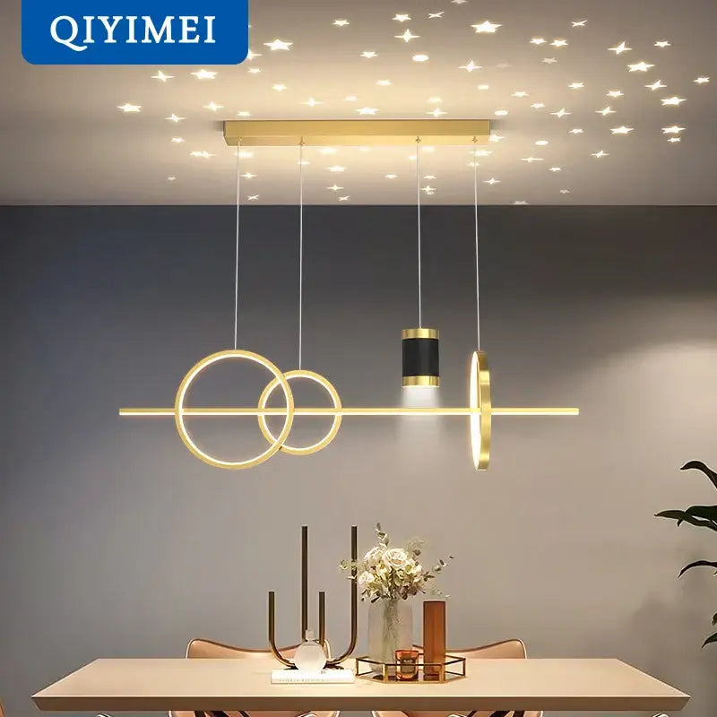 Modern gold ring pendant light with intersecting circular rings and central cylinder for dining room decorbites black nordic style pendant lights