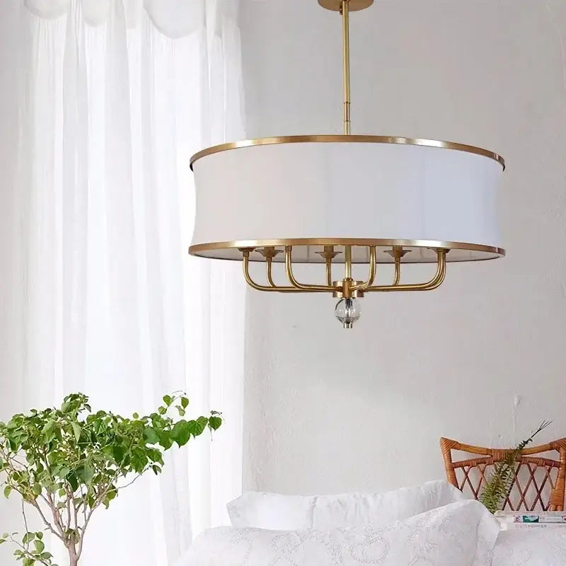Modern gold rod led chandelier with a drum-shaped gold metal frame and white fabric shade for living room decorbites gold rod