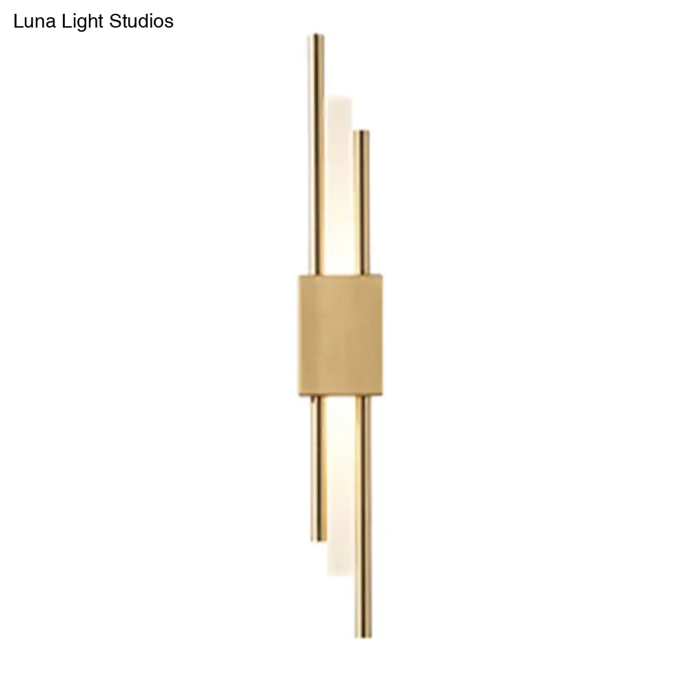 Modern gold-toned wall light with sleek vertical rods and frosted glass accents suitable for 110v-120v use