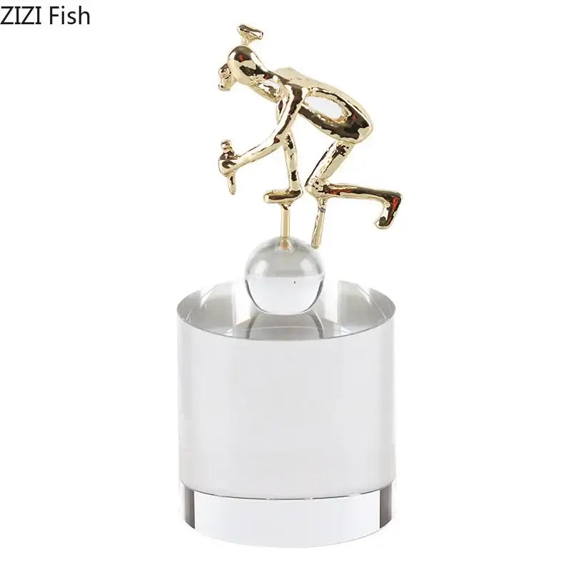Modern gold runner crystal sculpture featuring a gold cyclist figurine on clear acrylic base decorbites crystal sculpture