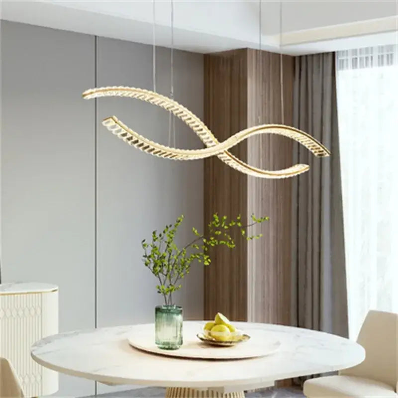 Modern gold s-shaped decorbites crystal led pendant light with sleek curved design for dining room lighting
