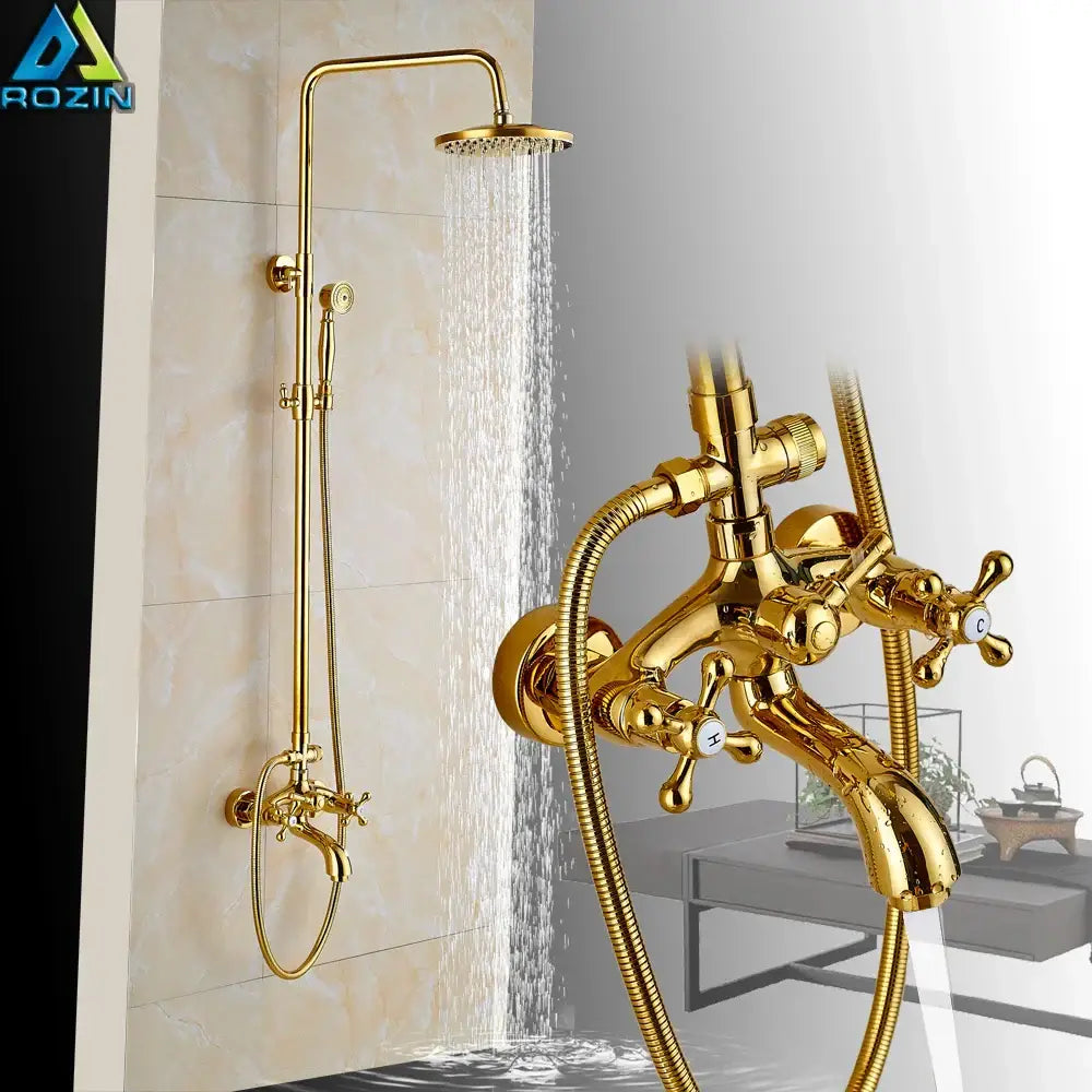 Modern gold shower mixer taps made of brass with rainfall head and handheld sprayer for bathroom use