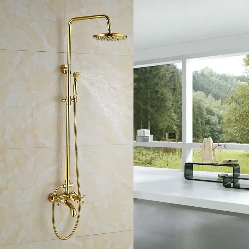 Modern gold shower mixer taps with rainfall head and handheld spray featuring a tall curved arm for bathroom use