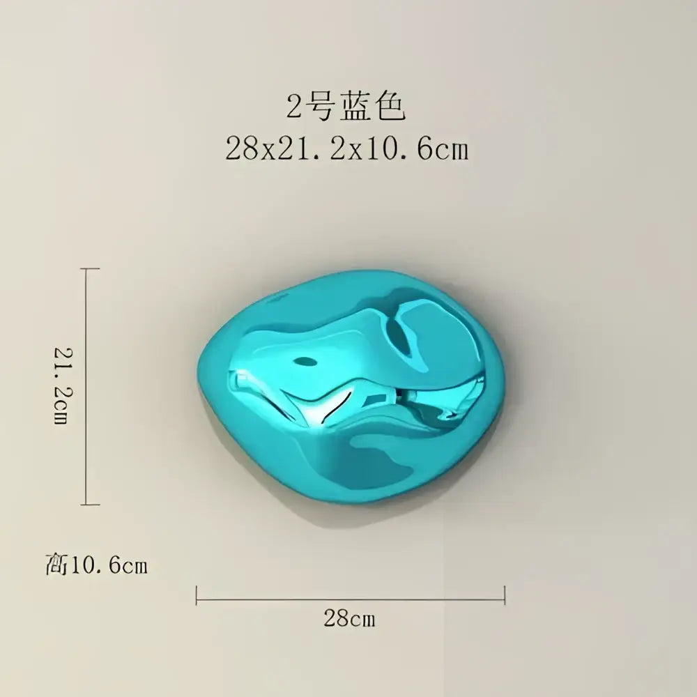 A glossy turquoise blue irregular stone wall ornament with a smooth reflective surface for modern living room decor