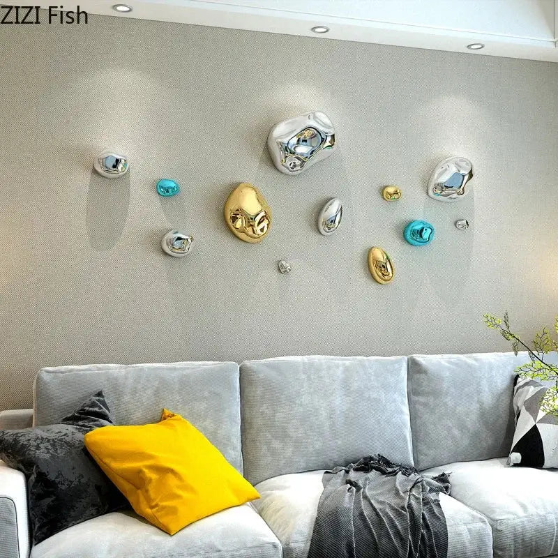 Modern gold and silver 3d stone wall ornaments with shiny metallic reflective surfaces for living room wall decor