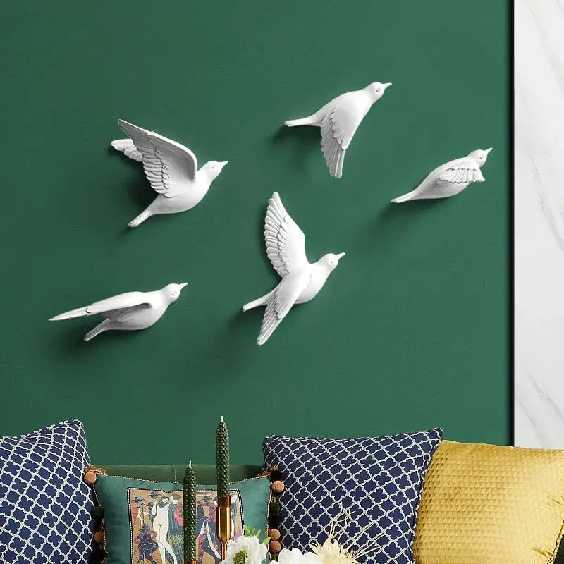 Modern gold and silver bird resin statue wall decor featuring white ceramic doves in flight for children’s room