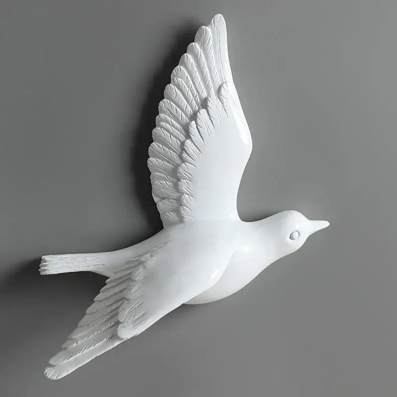 White ceramic bird resin statue wall decor with detailed feathered wings and glossy finish for children’s room