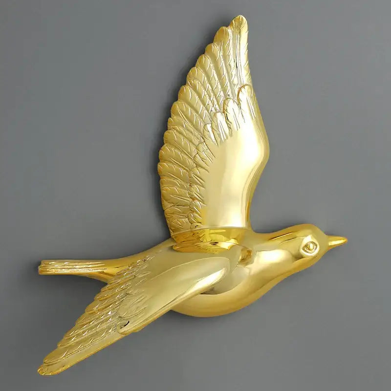 Modern gold bird resin statue wall decor with detailed feather texture and polished finish for children’s room
