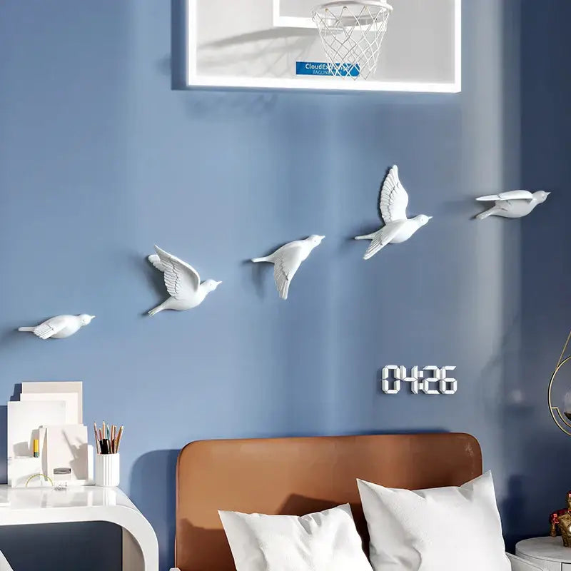 White ceramic bird resin statue wall decor arranged in flying formation for modern children’s room design