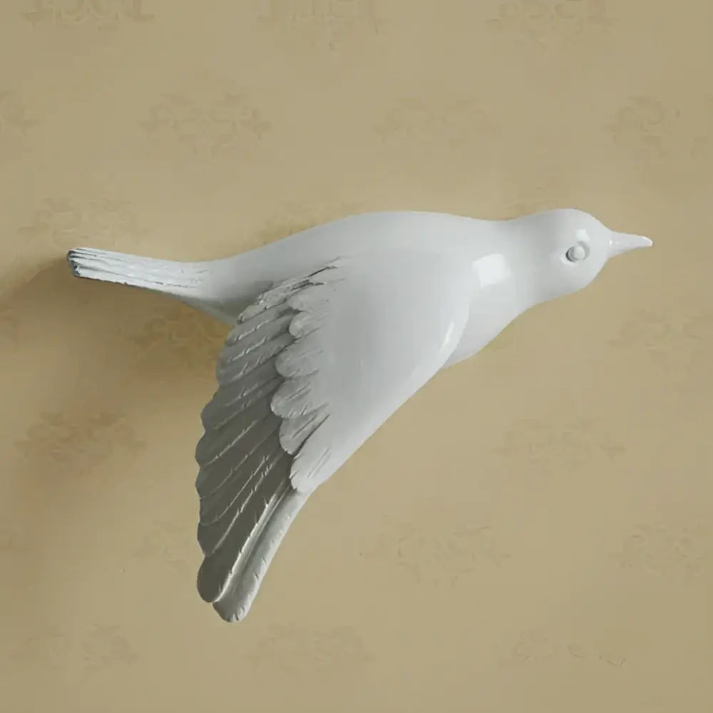 Modern white ceramic bird wall decor with gray feathered wings and glossy finish for children’s room resin statue wall