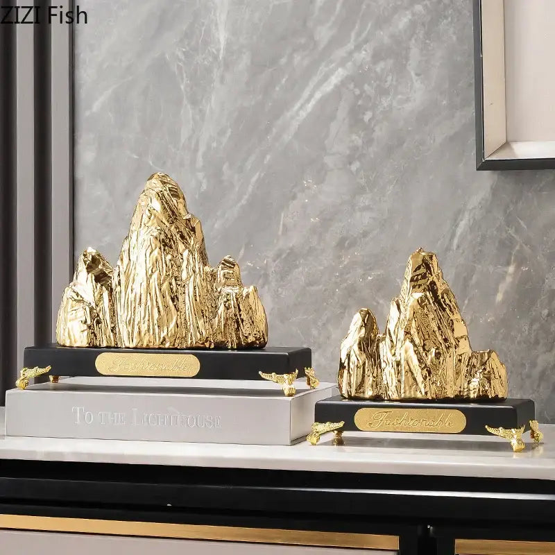 Modern gold and silver decorbites ceramic mountain sculpture with textured surfaces on black bases for living room decor