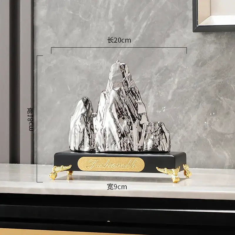 Shiny silver and gold decorbites ceramic mountain sculpture with fashionable engraving on black base for living room decor