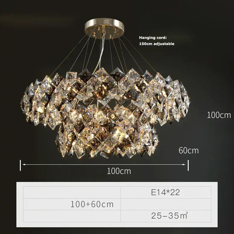 A modern gold and silver decorbites crystal dimmable two-tiered chandelier with brushed brass mount and adjustable cord