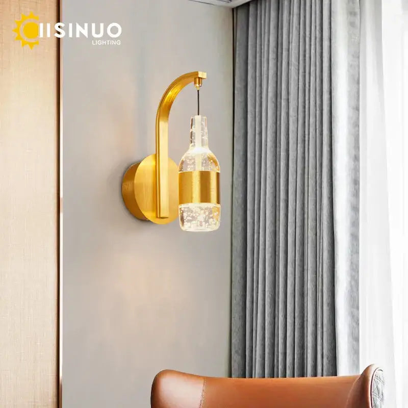 Modern gold led wall sconce with crystal led decorbites glass bottle shade and internal lighting for bedroom use