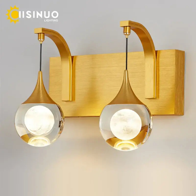 Modern gold and silver decorbites crystal led wall sconce with teardrop shades and brushed metal fixtures for bedroom decor