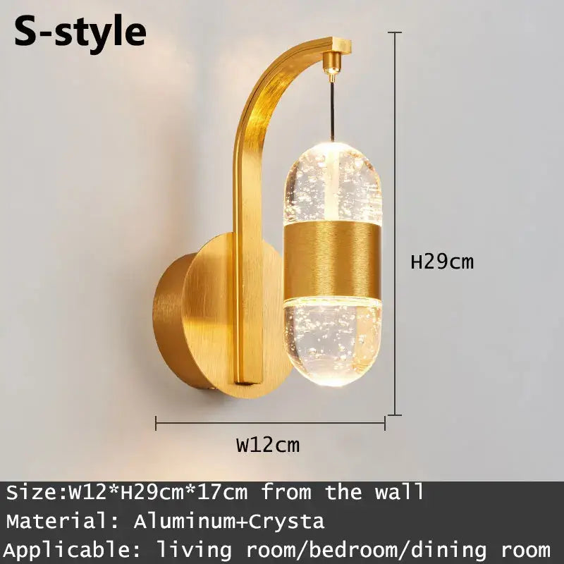 Modern gold and silver crystal led wall sconce with curved aluminum arm and decorbites crystal led globe for bedroom lighting