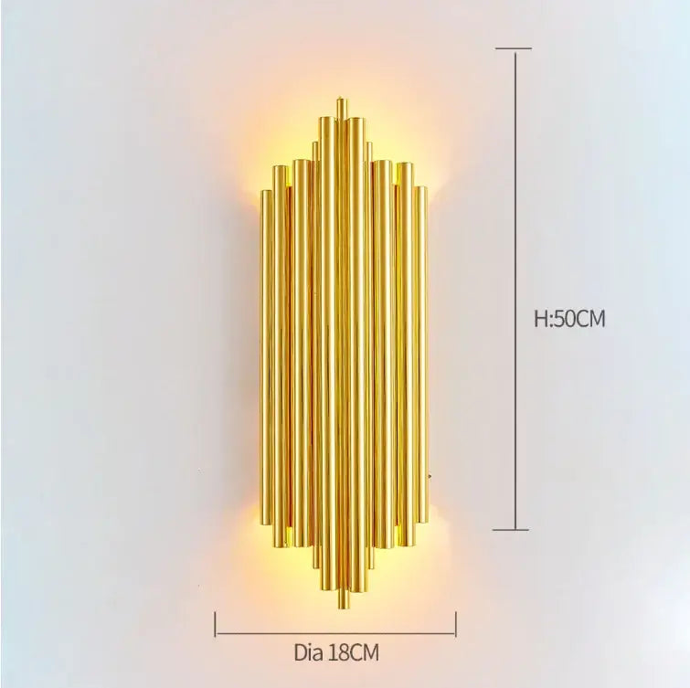 Modern gold wall lamp with golden brass vertical cylindrical rods in a symmetrical pattern for decorbites crystal wall lamp