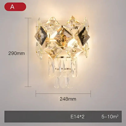 Modern gold and silver crystal wall sconce with stainless steel and decorbites crystal gold accents for bedroom lighting