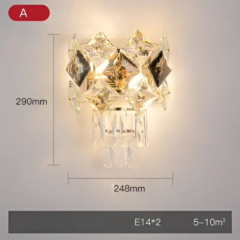Modern gold and silver crystal wall sconce with stainless steel and decorbites crystal gold accents for bedroom lighting