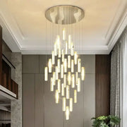 Modern gold and silver decorbites crystal chandelier with circular metallic base and cascading glass rods for dining room light