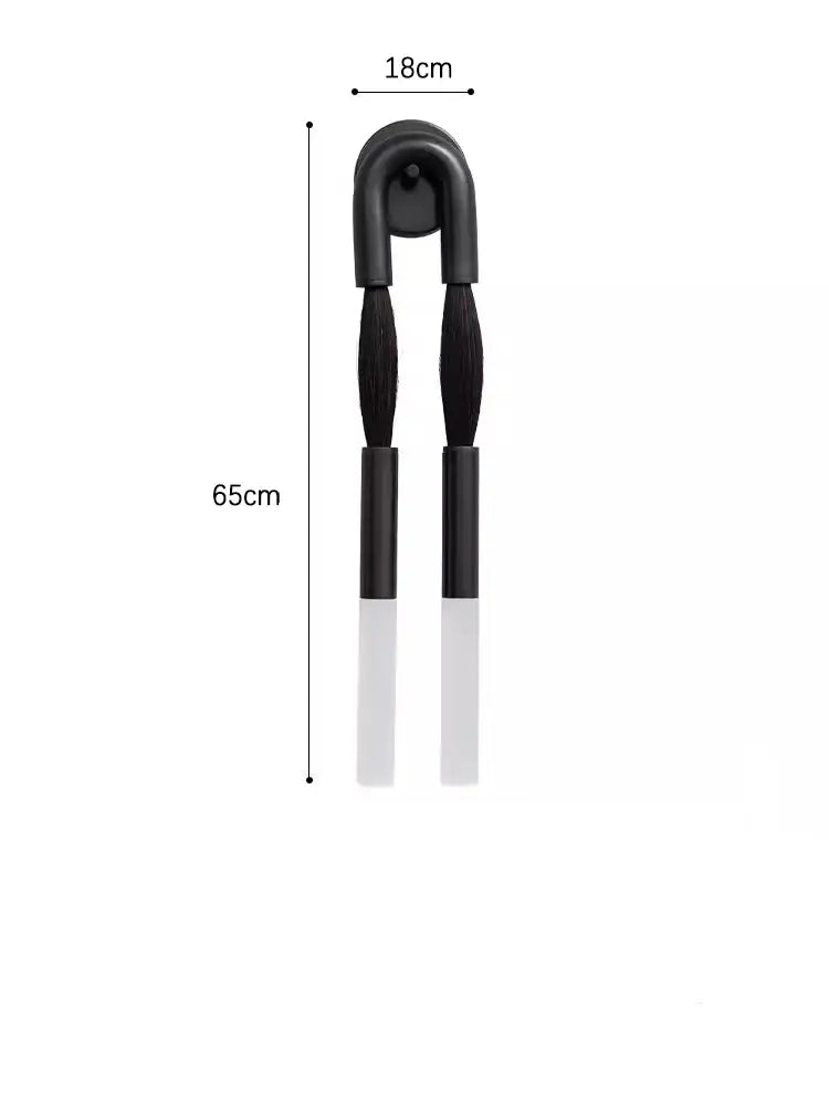 Black and white dual-ended tongs with curved handle 65cm length complementing decorbites designer tassel wall lamp