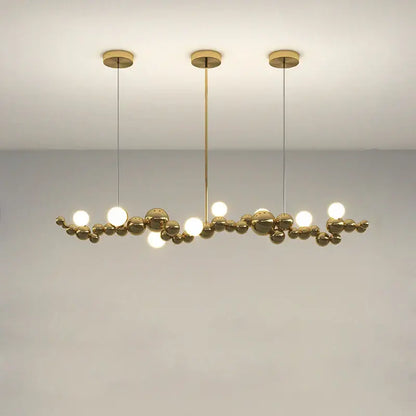 Modern gold and silver dimmable led hanging pendant light with a gold-toned branching spherical bulb cluster for dining room decorbites dimmable led