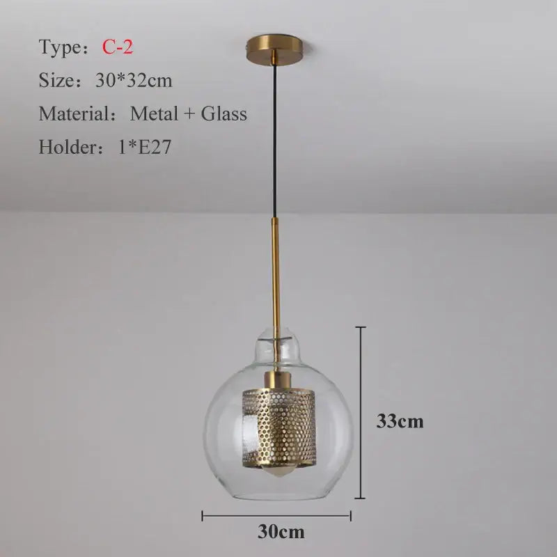 Modern gold and silver honeycomb glass pendant light with a ball glass pendant and perforated metal cylinder fixture