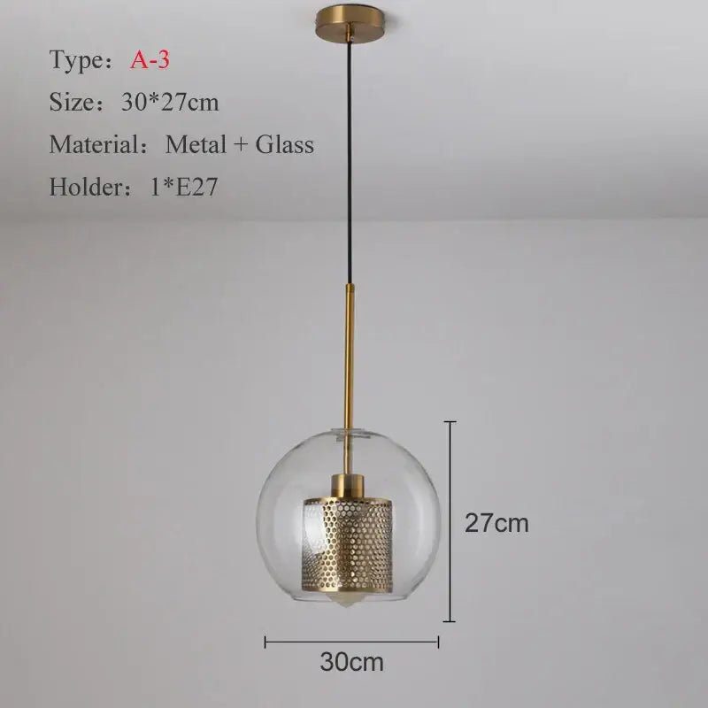 Modern gold and silver honeycomb glass pendant light with gold-toned spherical ball glass pendant and perforated shade