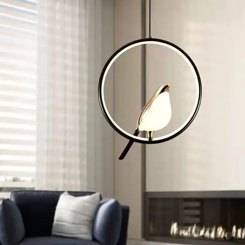 Modern pendant light with a black circular frame metallic finish and led bulbs featuring a bird-shaped lamp center