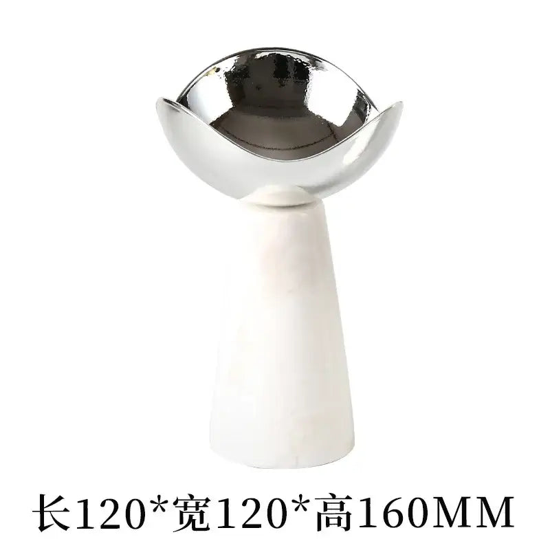 Modern dessert bowl with a silver metallic bowl top and white marble base ideal for decorbites golden tray displays