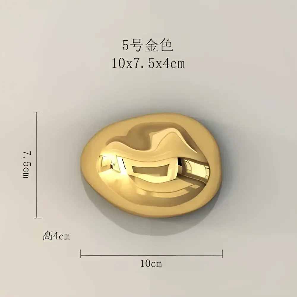 Modern gold metallic 5-number model oval button with smooth finish used as wall hanging ornaments for living room decor