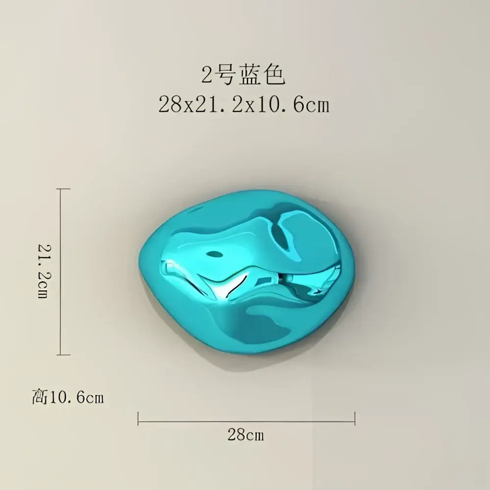 Glossy turquoise blue irregular modern metallic rock wall hanging ornament with smooth reflective surface for living room