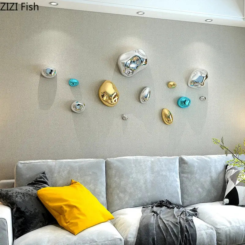 Shiny irregular gold and silver metallic rock wall hanging ornaments with reflective surfaces for living room decor