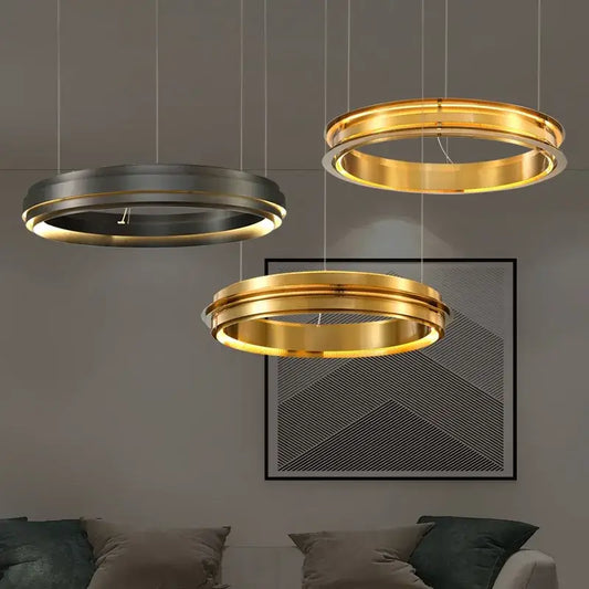 Three modern circular pendant lights with sleek metallic gold and silver finish gold ring chandelier decorbites gold ring