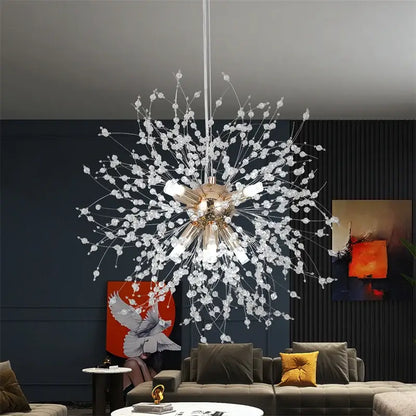 A modern gold and silver sputnik pendant light chandelier with a sparkling crystal center and glass bead arms