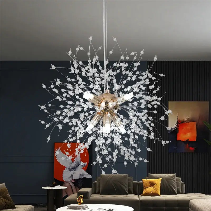 A modern gold and silver sputnik pendant light chandelier with a sparkling crystal center and glass bead arms