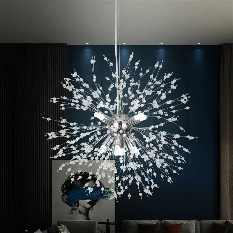 Modern gold and silver sputnik pendant light featuring a sparkling silver chandelier with crystal droplets and metallic arms
