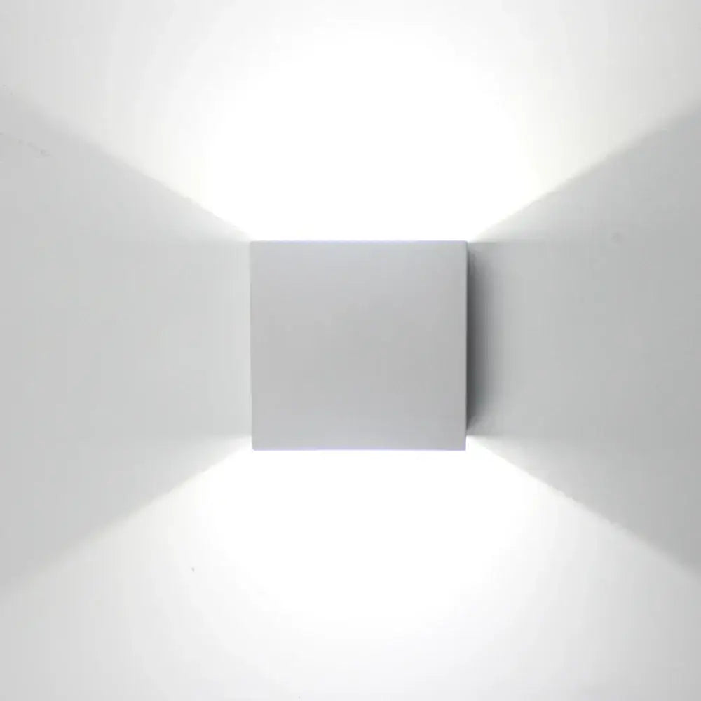 Minimalist white square wall lamps with gold and silver accents featuring soft diffused lighting for bedroom home decor