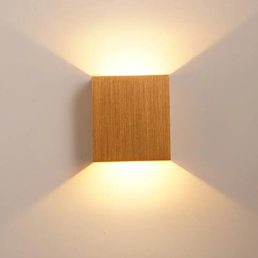Modern gold and silver warm-toned square wall lamps with wood-grain finish perfect for bedroom wall lights and home decor