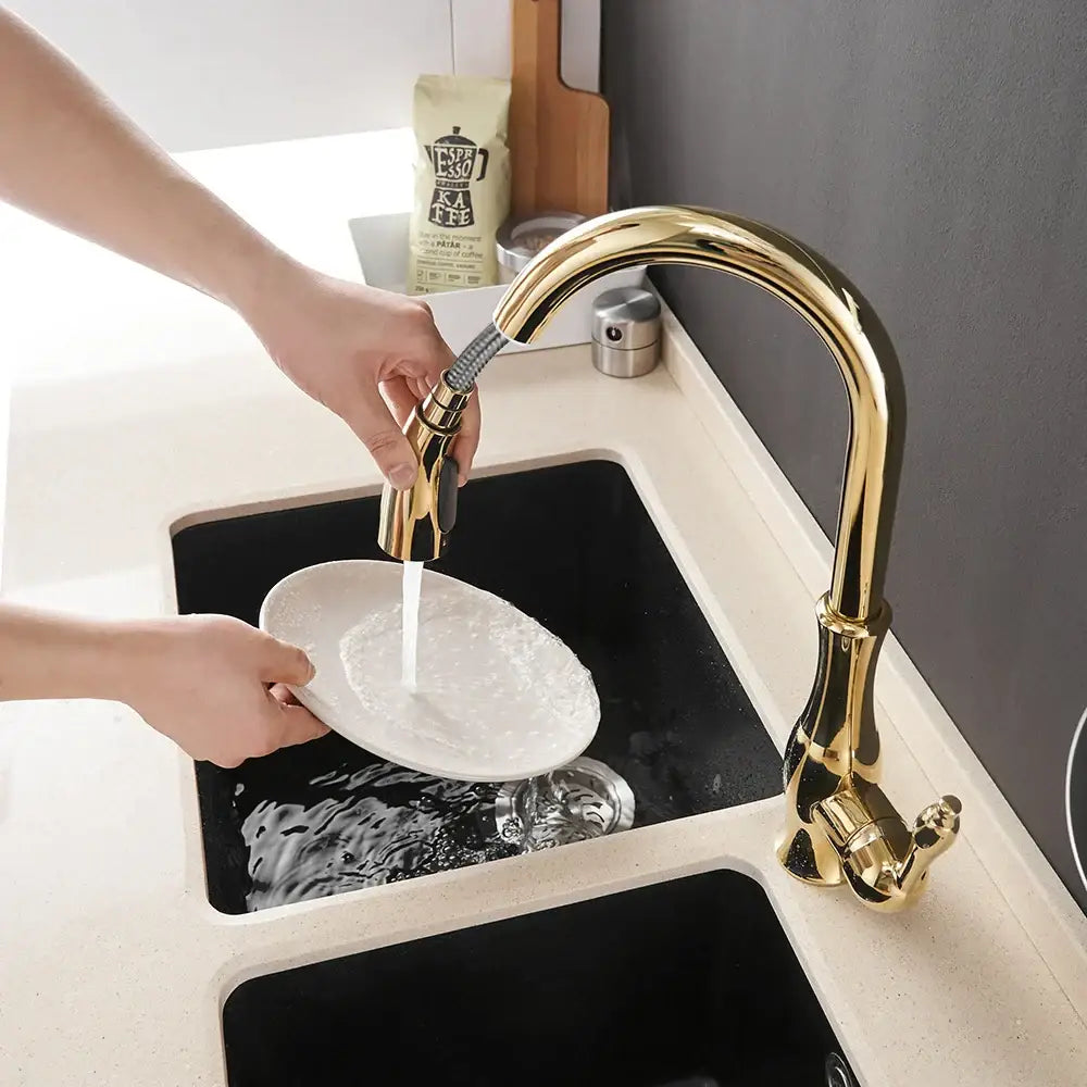 Modern gold single handle pull out kitchen faucet with curved spout and pull-down spray head decorbites gold single handle
