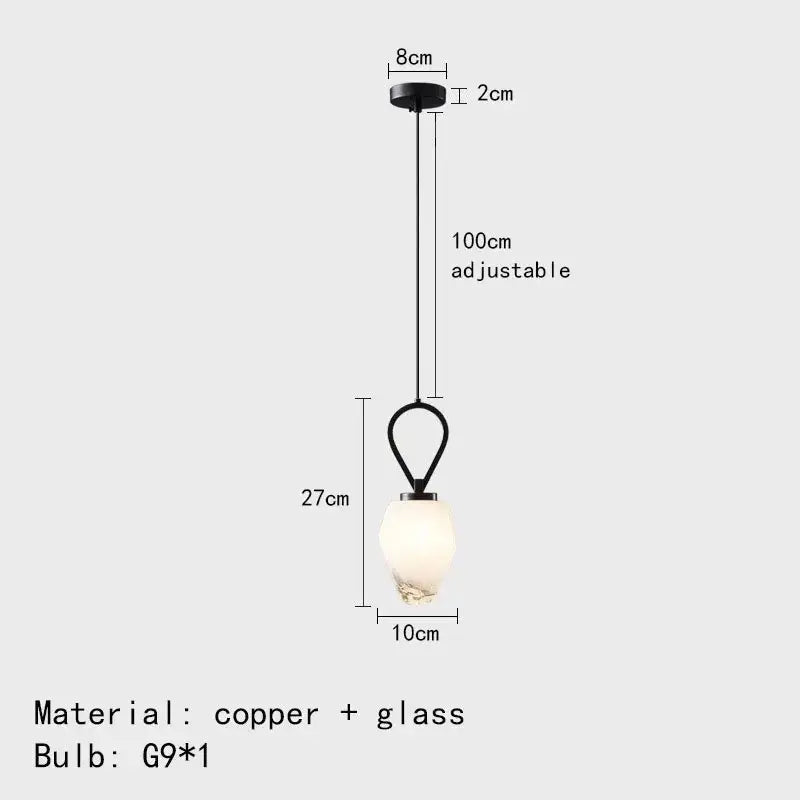 Black copper and glass pendant light with frosted globe featuring decorbites adjustable brass chandelier design
