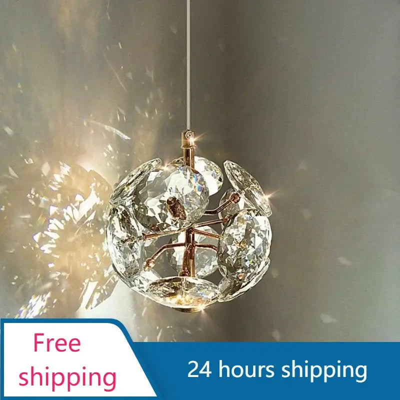 Modern gold spherical crystal pendant chandelier with faceted clear crystals and metal frame for bedroom lighting