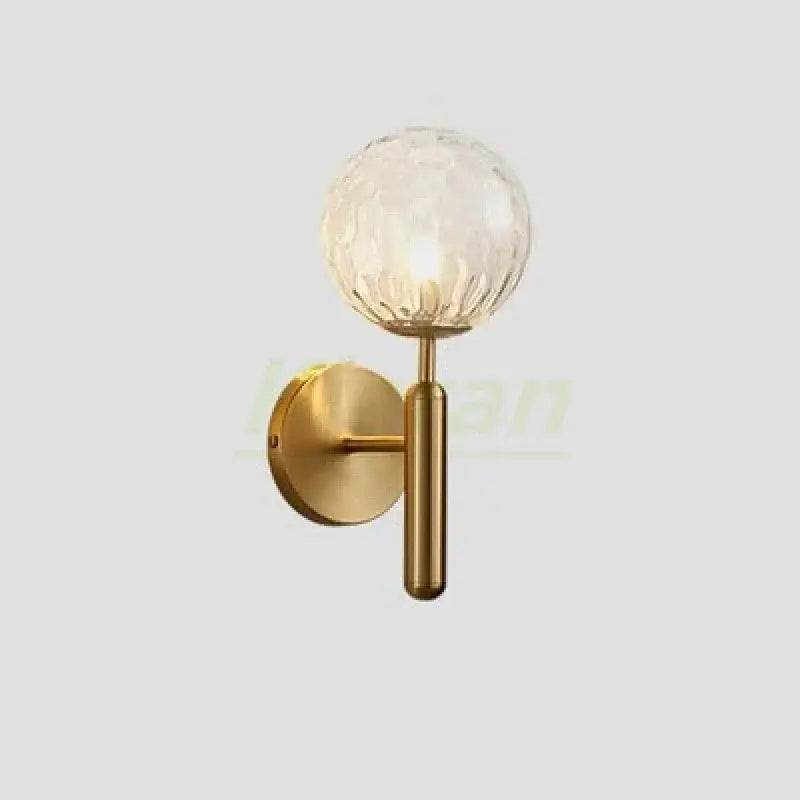 Modern gold spherical frosted glass led wall lamp with textured faceted globe ideal for bedroom wall lamps