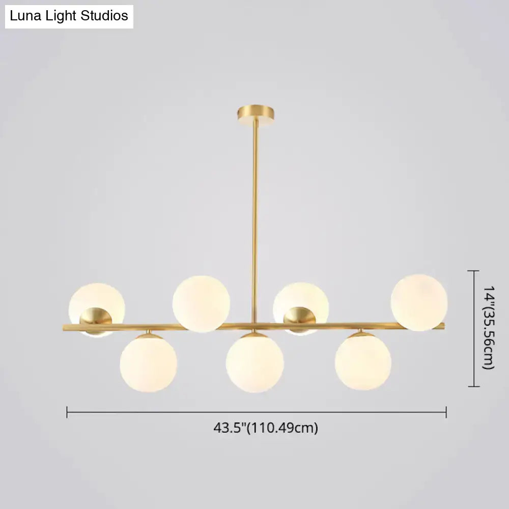 Modern gold spherical island ceiling light with six frosted glass globe pendant lighting for dining room use