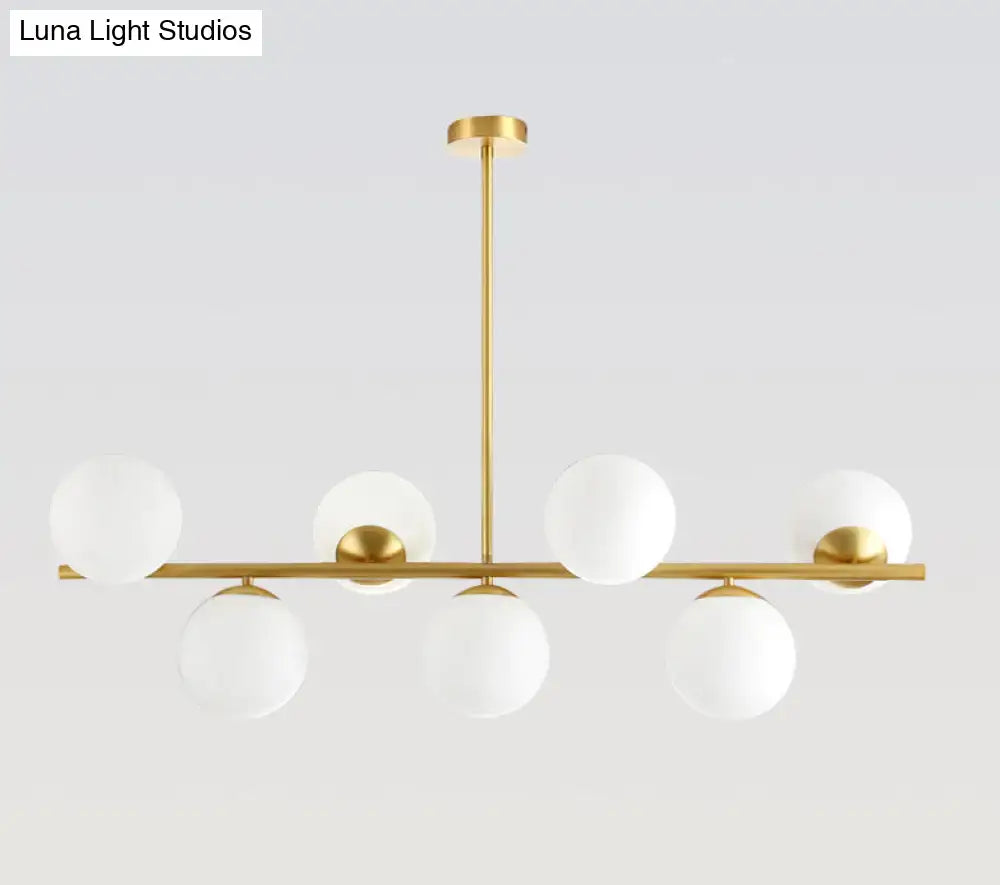 Modern gold spherical island ceiling light with six frosted glass globe shades pendant lighting for dining room
