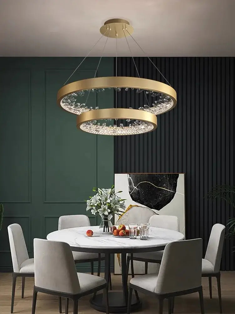Modern gold spiral crystal led chandelier with gold-toned double-ring and decorbites crystal led accents for dining room decor