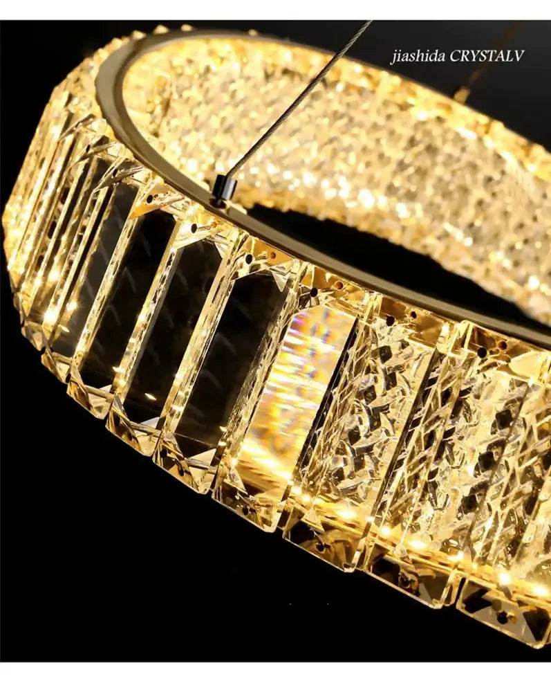 Modern gold spiral crystal led pendant chandelier featuring faceted rectangular crystals for elegant decorbites crystal led decor