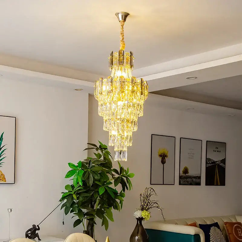 Modern gold spiral decorbites crystal chandelier pendant light with tiered golden crystals and brass accents