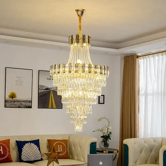 Modern gold spiral decorbites crystal chandelier pendant light with gold frame and cascading clear crystals refracting light